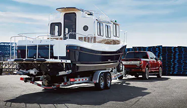 2022 Nissan TITAN Truck towing boat | Nissan of Gilroy in Gilroy CA