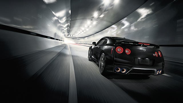 2023 Nissan GT-R seen from behind driving through a tunnel | Nissan of Gilroy in Gilroy CA
